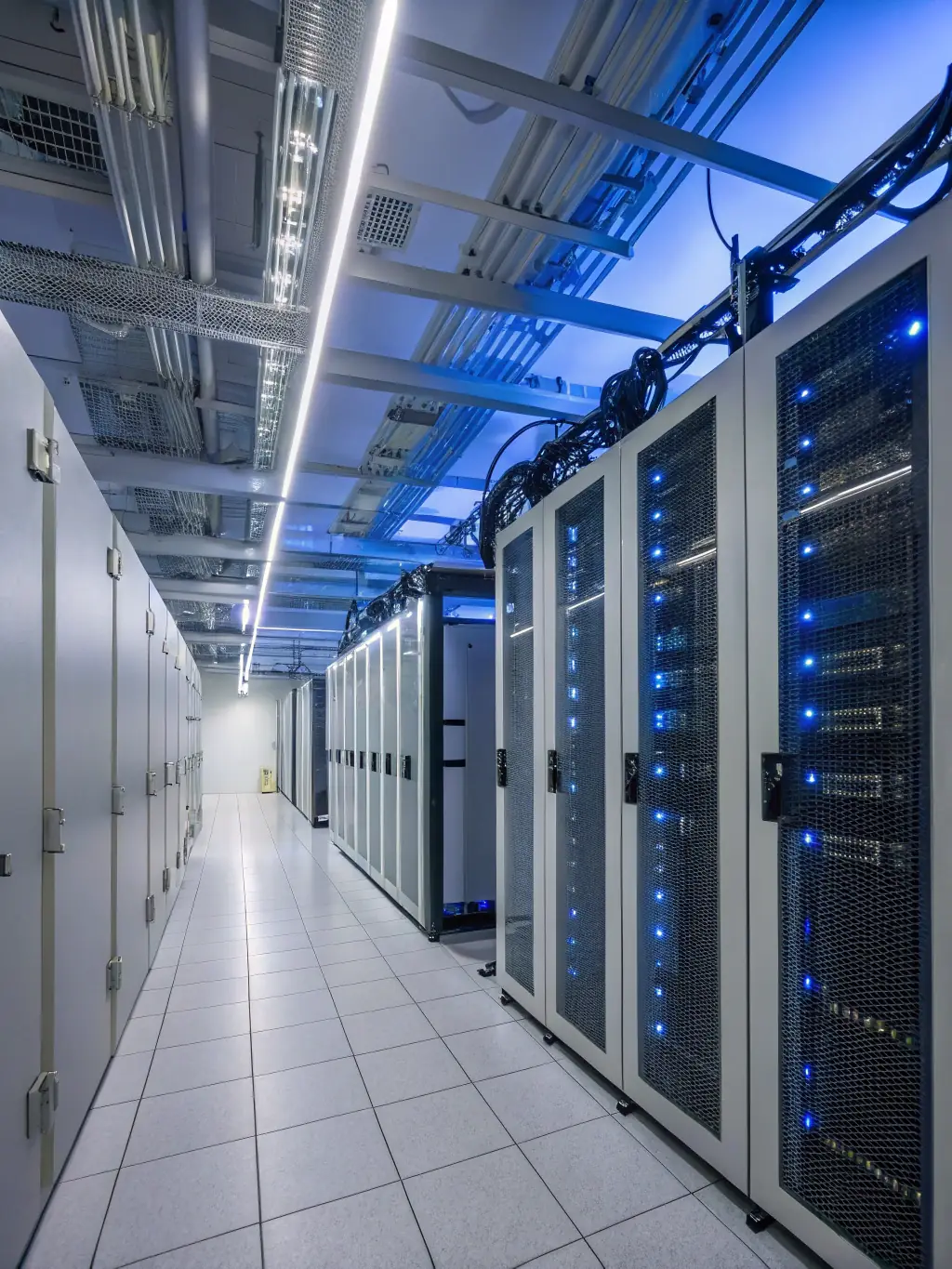 A small, efficient data center with servers, cooling systems, and power backups, highlighting space optimization and security.